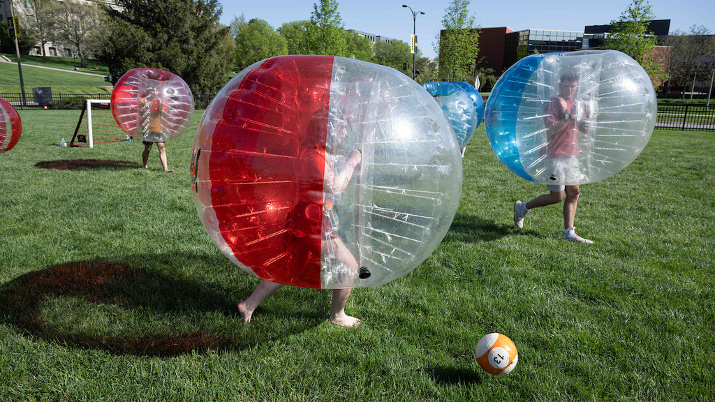 seniors play with inflatable balloons