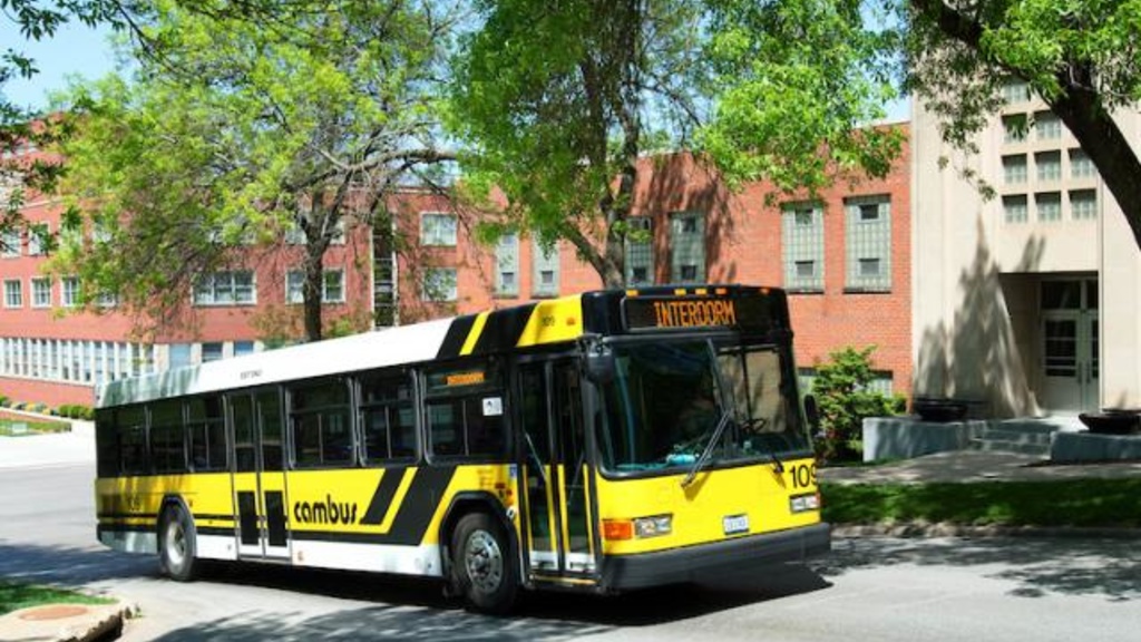 A cambus driving up a hill